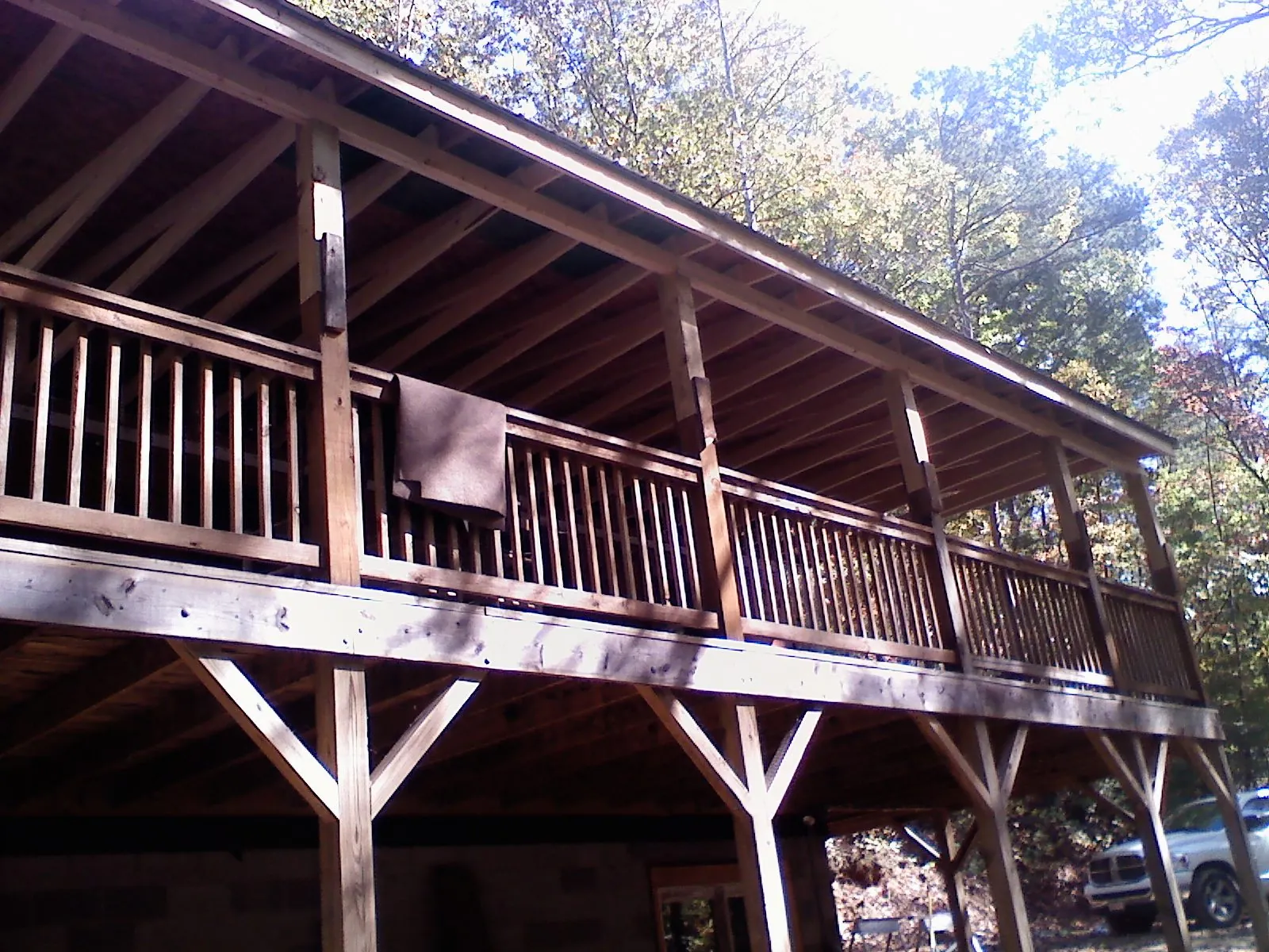 Timber framing under a new elevated porch and deck — Roof Leak Repair in Rimrock by Roofing Brothers
